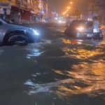 t-08 Pattaya tourists wade through flashfloods in Walking Street, Soi Bua khao on Sunday evening 1